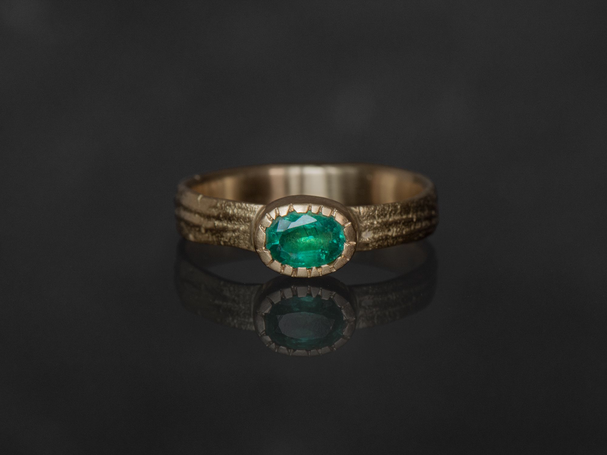 Ana Sitia large emerald ring by Emmanuelle Zysman