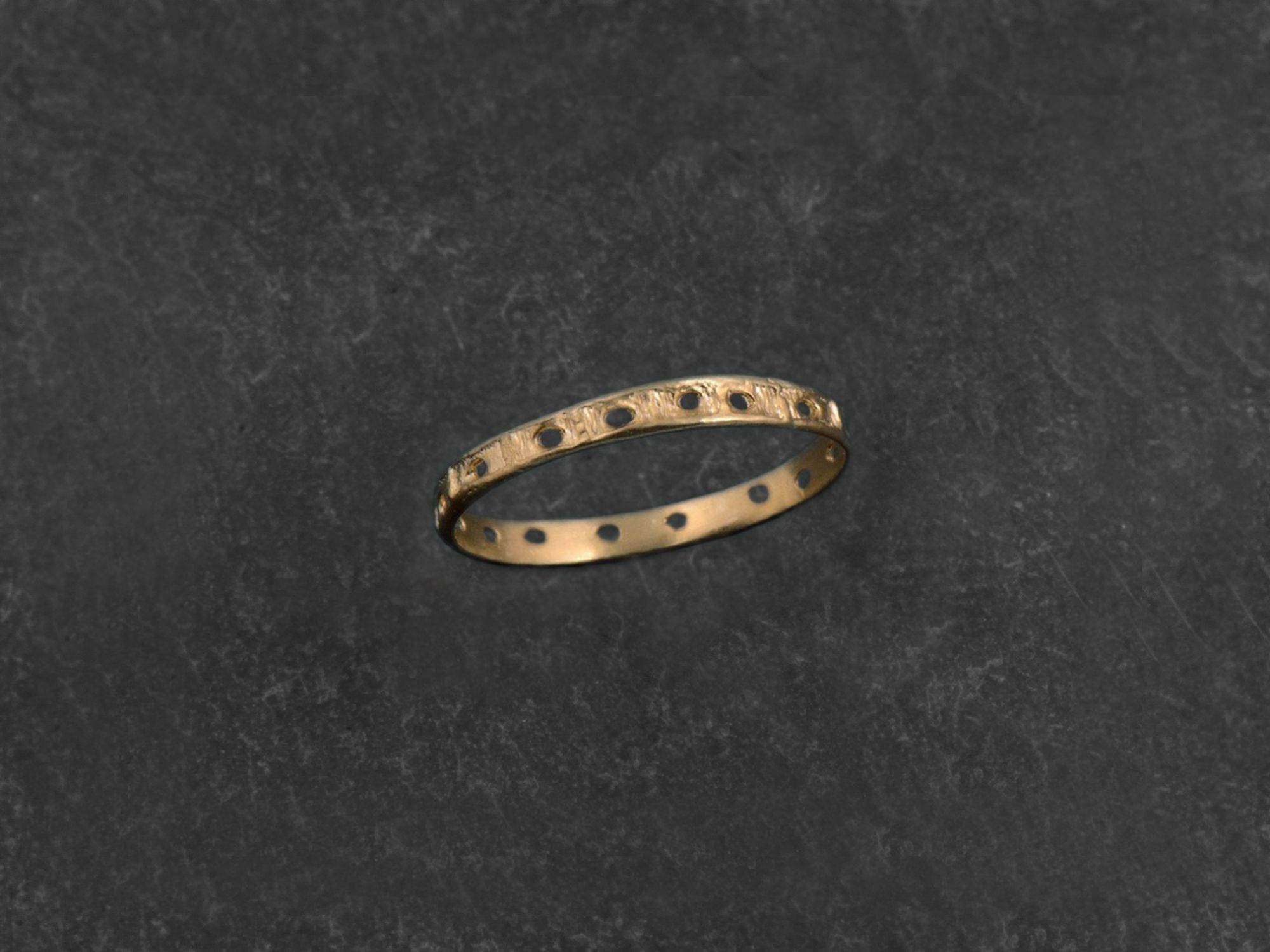 Minos peforated yellow gold ring by Emmanuelle Zysman