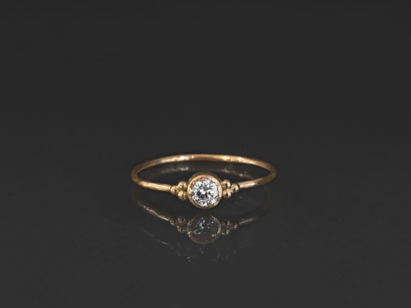 Eve yellow gold white diamond ring by Emmanuelle Zysman